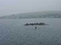 Port Ellens Distilleri kan sk�njas i dimman